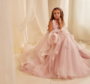 Child in luxury pink tulle flower girl gown