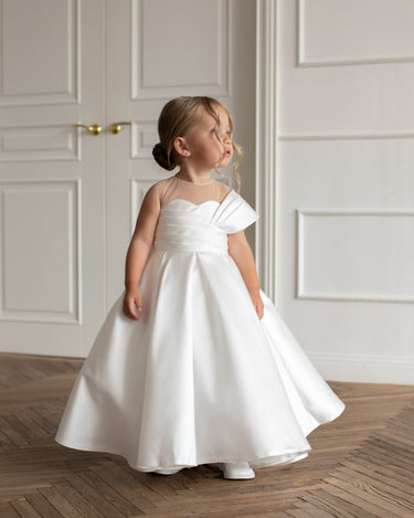 Little girl wearing the Elise gown, font view, white mikado flower girl dress.