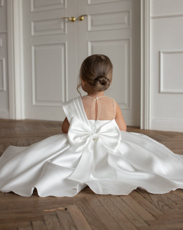 Close up of the Elise gown pleated mikado skirt.