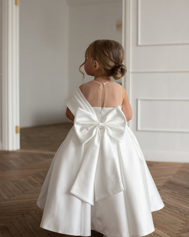 Back view of the Elise gown showing statement bow