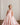 Little girl wearing luxury mikado flower girl gown in full length front view