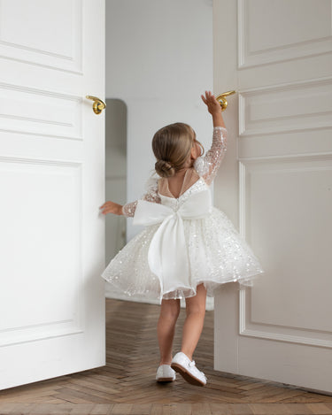 Girl walking in Luna sequin dress full length view