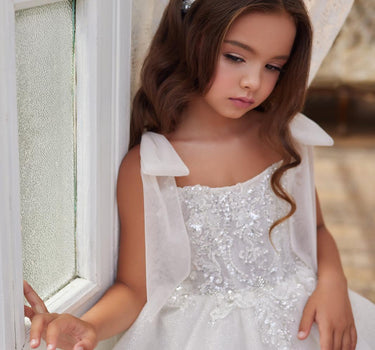 Close up of beaded bodice and ruffled tulle skirt of the Elara Dress