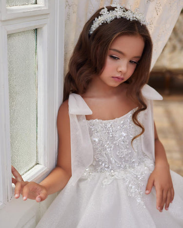 Close up of beaded bodice and ruffled tulle skirt of the Elara Dress