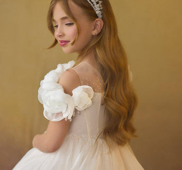 Close up of off shoulder floral neckline on the Maison luxury kids gown