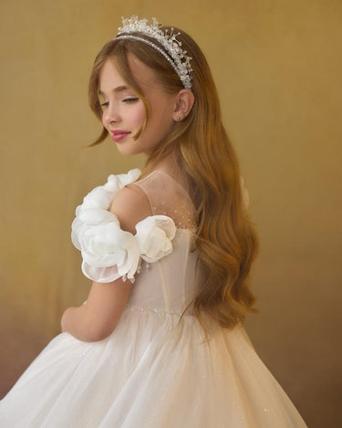 Close up of off shoulder floral neckline on the Maison luxury kids gown